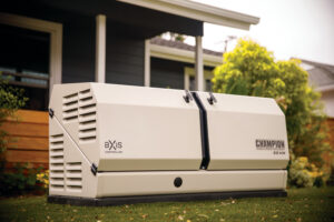 A generator sitting on the grass in front of a house.