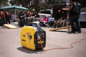 A generator in the middle of a crowd of people.